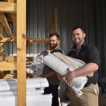 Two men moving into Self Storage unit